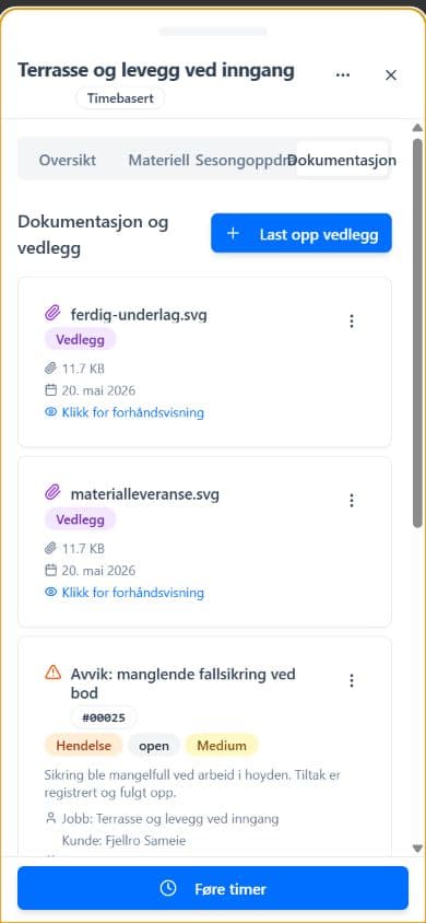 Mobilskjerm med dokumentasjon og bildevedlegg på jobb